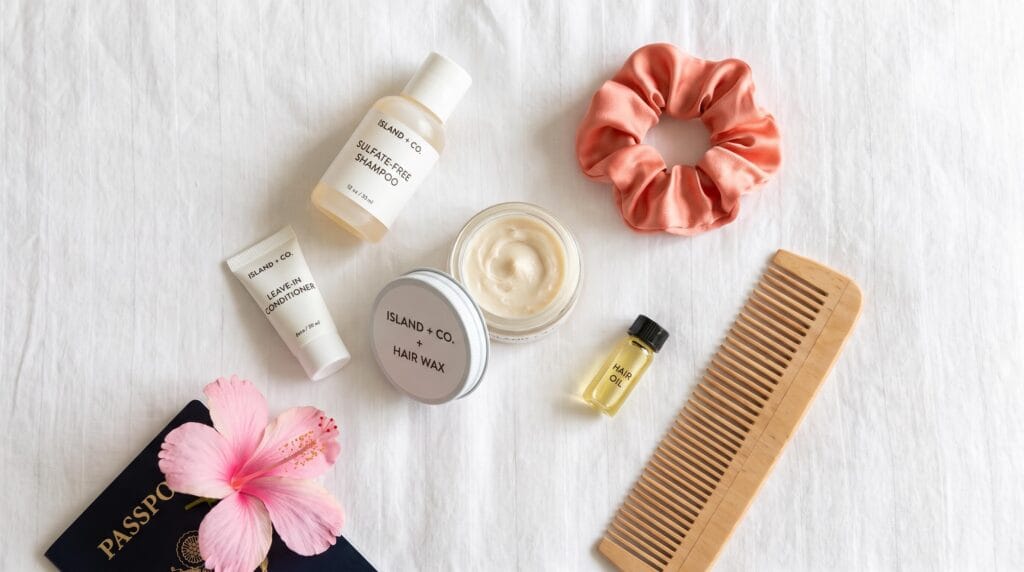  influencer showing complete travel hair care kit for humid tropical weather
