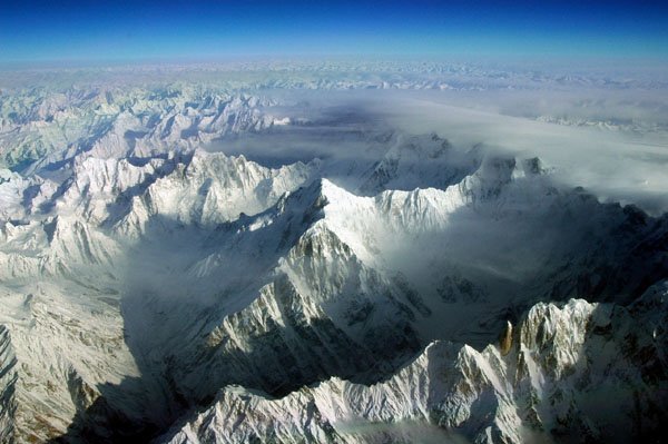 Aerial view of the Batura Muztagh with Sangemarmar, the Batura Wall and Passu Sar in cloud