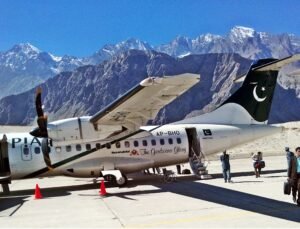 PIA aircraft on the apron at Skardu airport with mountains in Gilgit-Baltistan