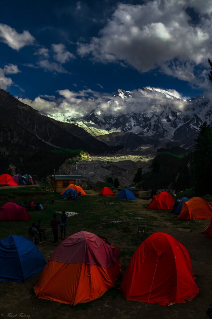Camps at Fairy Meadows with Nanga Parbat rising above the Diamer Valley