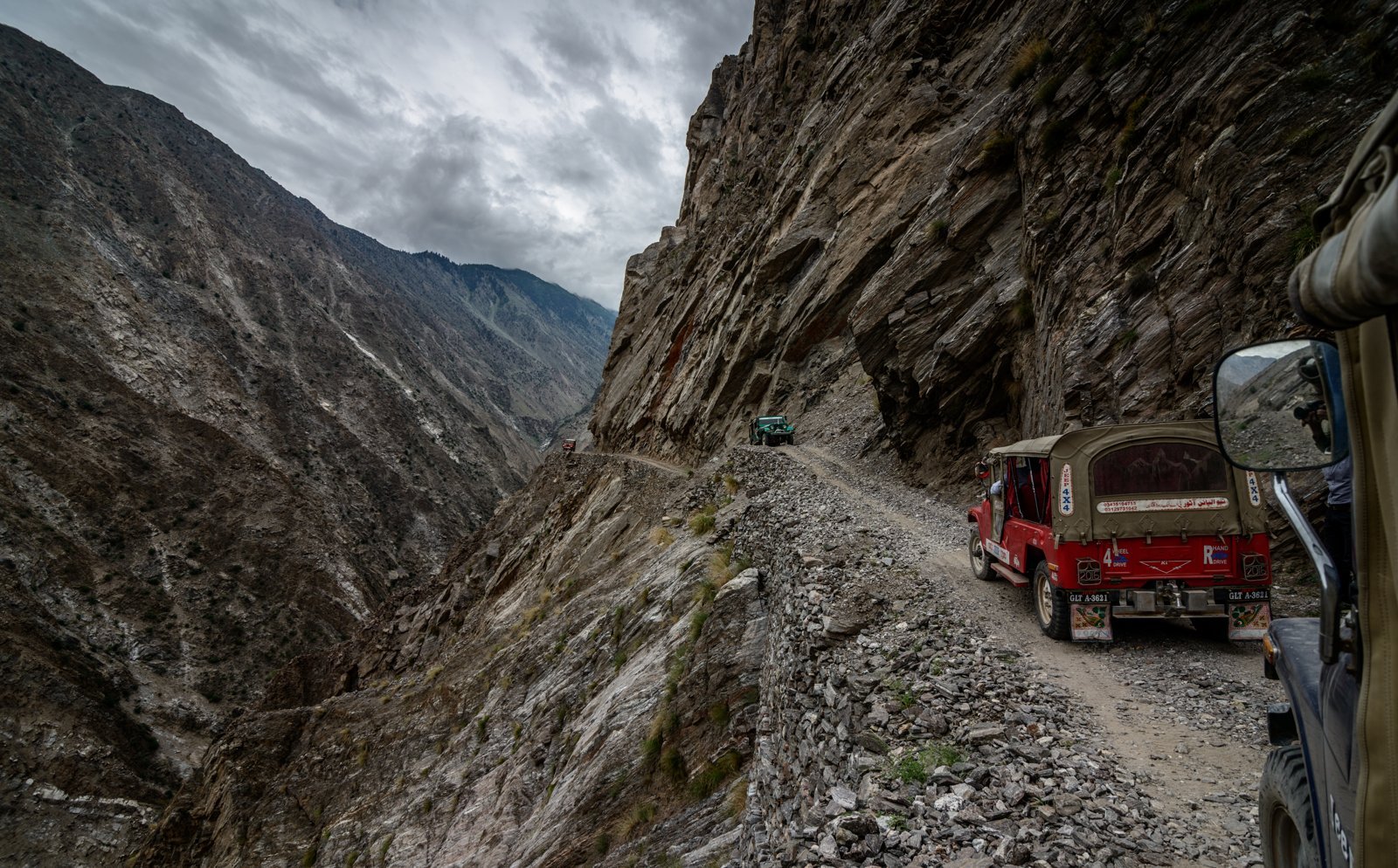 Jeep on the narrow mountain track from Raikot Bridge to Tato village below Fairy Meadows.