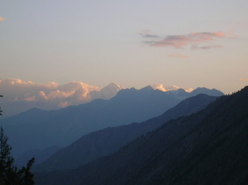 Haramosh Peak in the distance beyond layered mountain ridges