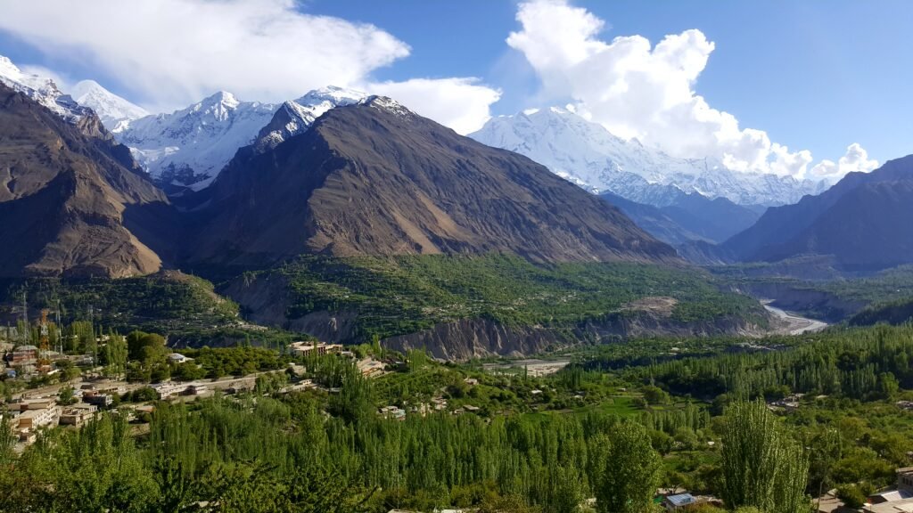 Hunza Valley around Karimabad, with terraced fields, village houses and snow-capped peaks in the distance