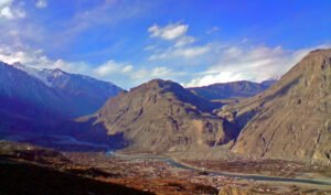 Gilgit City and the river seen from above, with mountains behind