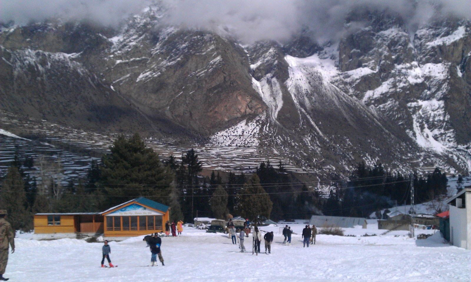 Skiers on the snow slope at Naltar Valley