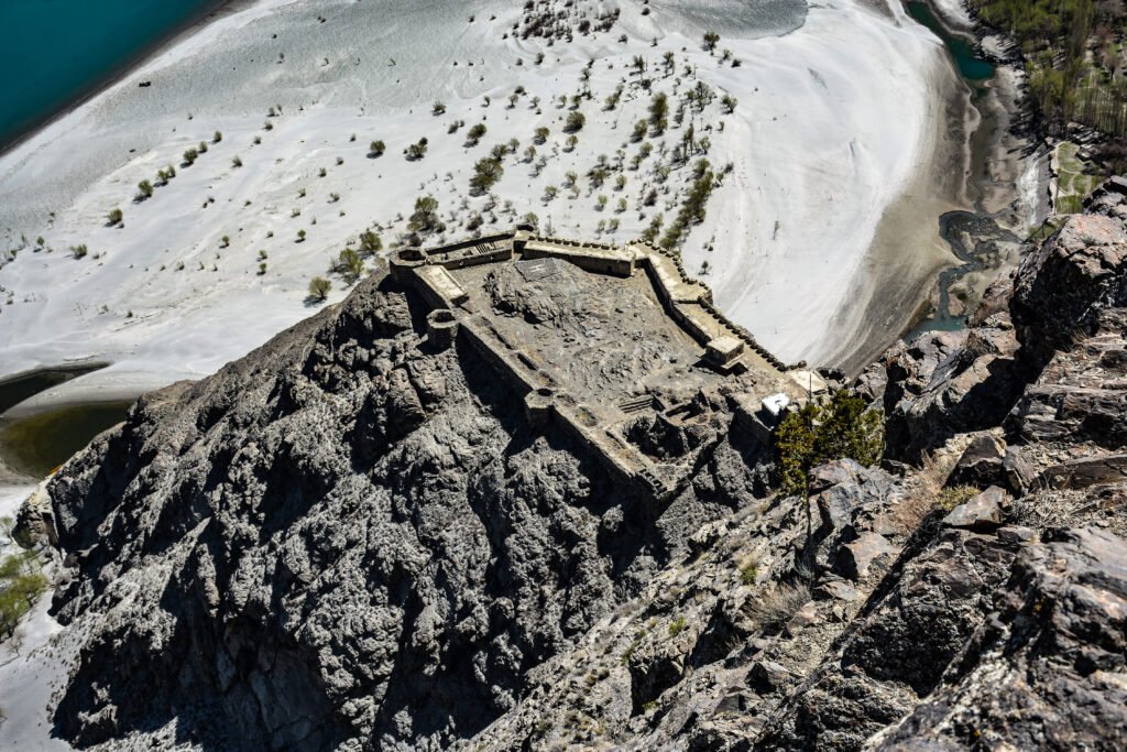 Kharpocho Fort on its rocky hill above the Indus River in Skardu