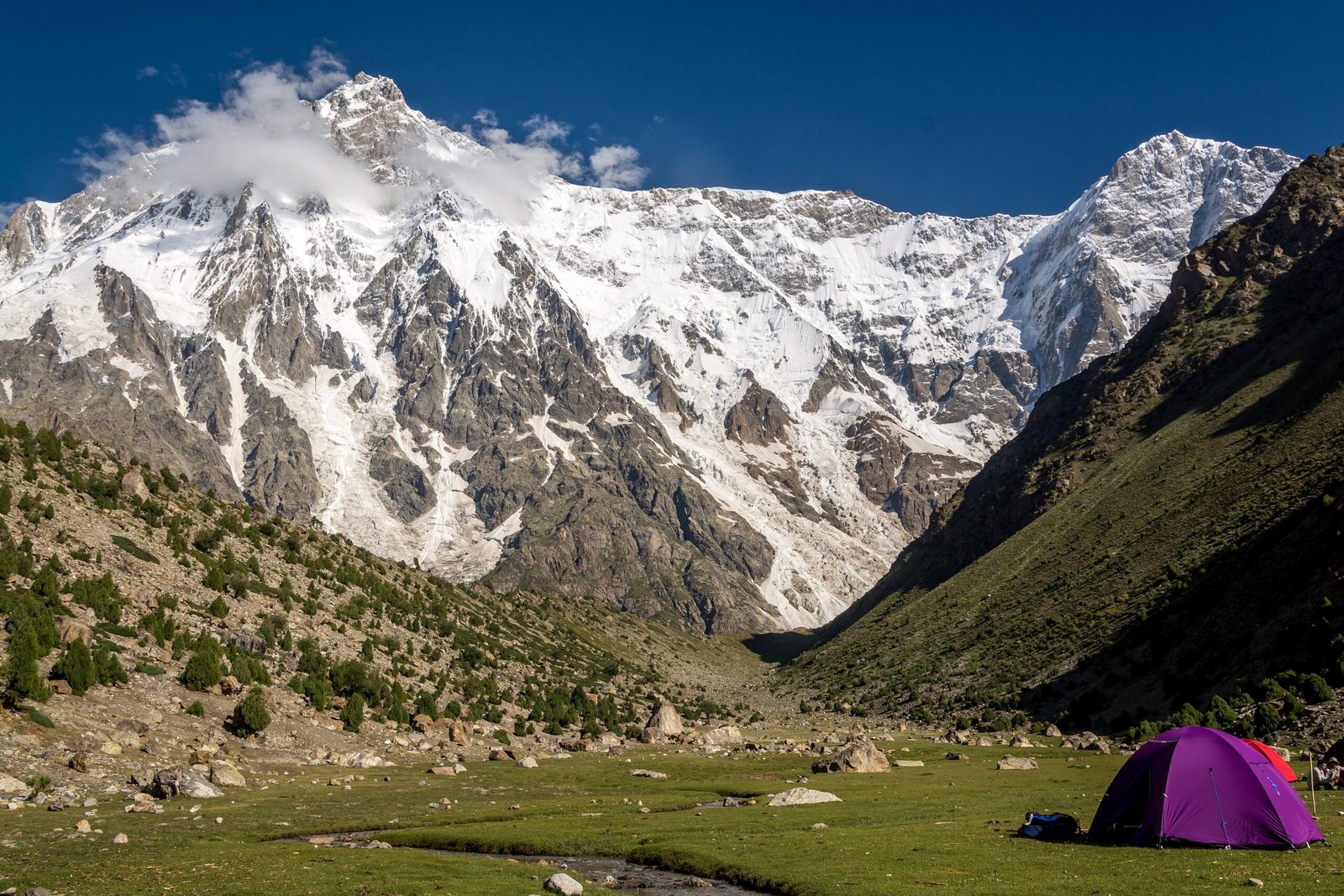 Tents at Herligkoffer Base Camp beneath the Rupal Face of Nanga Parbat