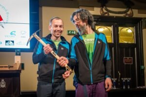 2017 Piolets d'Or winners Sergey Nilov and Dmitry Golovchenko with their golden ice axe