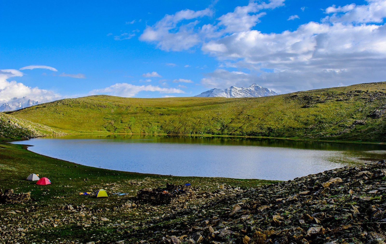 Tents pitched beside Rush Lake in Nagar Valley.
