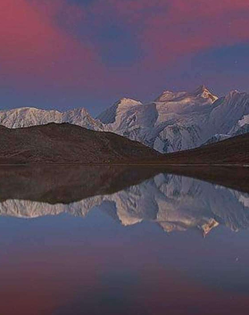 Rush Lake at sunset, the Hispar range reflected in still water, Nagar