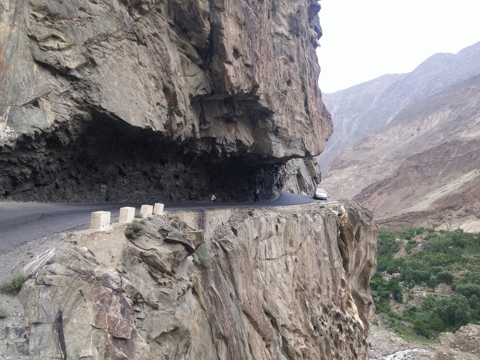 Cliff-side road above the valley on the route to Skardu
